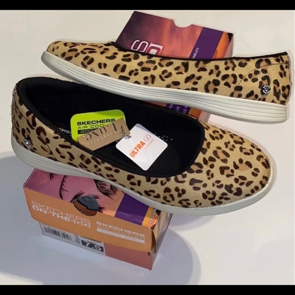 Skechers leopard shoes faux natural hide with snazzy metal logo side detail.😄